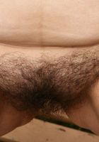 Cora spreads her big bush outside, Cora (cor034) ATK Natural & Hairy: Cora (Cora spreads her big bush outside)