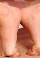 Emma loves to tease with her red bush and polished toes, Emma (emm010) ATK Archives: Emma (Emma loves to tease with her red bush and polished toes)