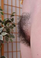 Emma tugs on her lady fur., Emma Evins (emm030) ATK Natural & Hairy: Emma Evins (Emma tugs on her lady fur.)
