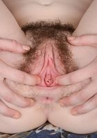 Emma Evins squats down to split her hairy peach apart., Emma Evins (emm030) ATK Natural & Hairy: Emma Evins (Emma Evins squats down to split her hairy peach apart.)