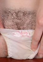 Emma throwing her legs back and spreading her magic muff., Emma Evins (emm030) ATK Natural & Hairy: Emma Evins (Emma throwing her legs back and spreading her magic muff.)