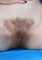 Keilyn shows off her full hairy bush in the garden, Keilyn (kei011) ATK Petites: Keilyn (Keilyn shows off her full hairy bush in the garden)