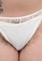 Kitty spreads her legs and lets the fur spill out., Kitty (kit027) ATK Natural & Hairy: Kitty (Kitty spreads her legs and lets the fur spill out.)