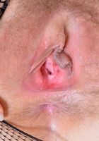 Leona spreads her mature pussy wide, Leona (leo010) ATK Natural & Hairy: Leona (Leona spreads her mature pussy wide)