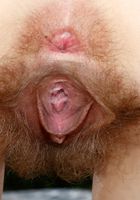 Mercy squats down and spreads her fur, Mercy West (mer029) ATK Natural & Hairy: Mercy West (Mercy squats down and spreads her fur)