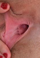 Nickey grabs her pink lips and spreads., Nickey Huntsman (nic093) ATK Petites: Nickey Huntsman (Nickey grabs her pink lips and spreads.)