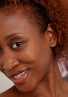 Black babe Nina slips out of g-string panties, Nina (nin028) ATK Exotics: Nina (Black babe Nina slips out of g-string panties)