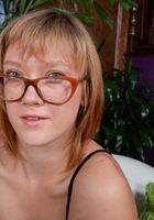 Presley squats down and lets her hairy pussy hang., Presley Lane (pre007) ATK Natural & Hairy: Presley Lane (Presley squats down and lets her hairy pussy hang.)