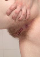 Rogue is in the bath getting her hairy pussy so wet., Rogue (rog004) ATK Natural & Hairy: Rogue (Rogue is in the bath getting her hairy pussy so wet.)