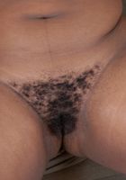 Naughty thick black babe Simone strips and spreads her hairy pussy, Simone (sim023) ATK Exotics: Simone (Naughty thick black babe Simone strips and spreads her hairy pussy)